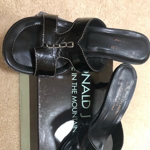 Donald J Pliner Black open toe shoes.